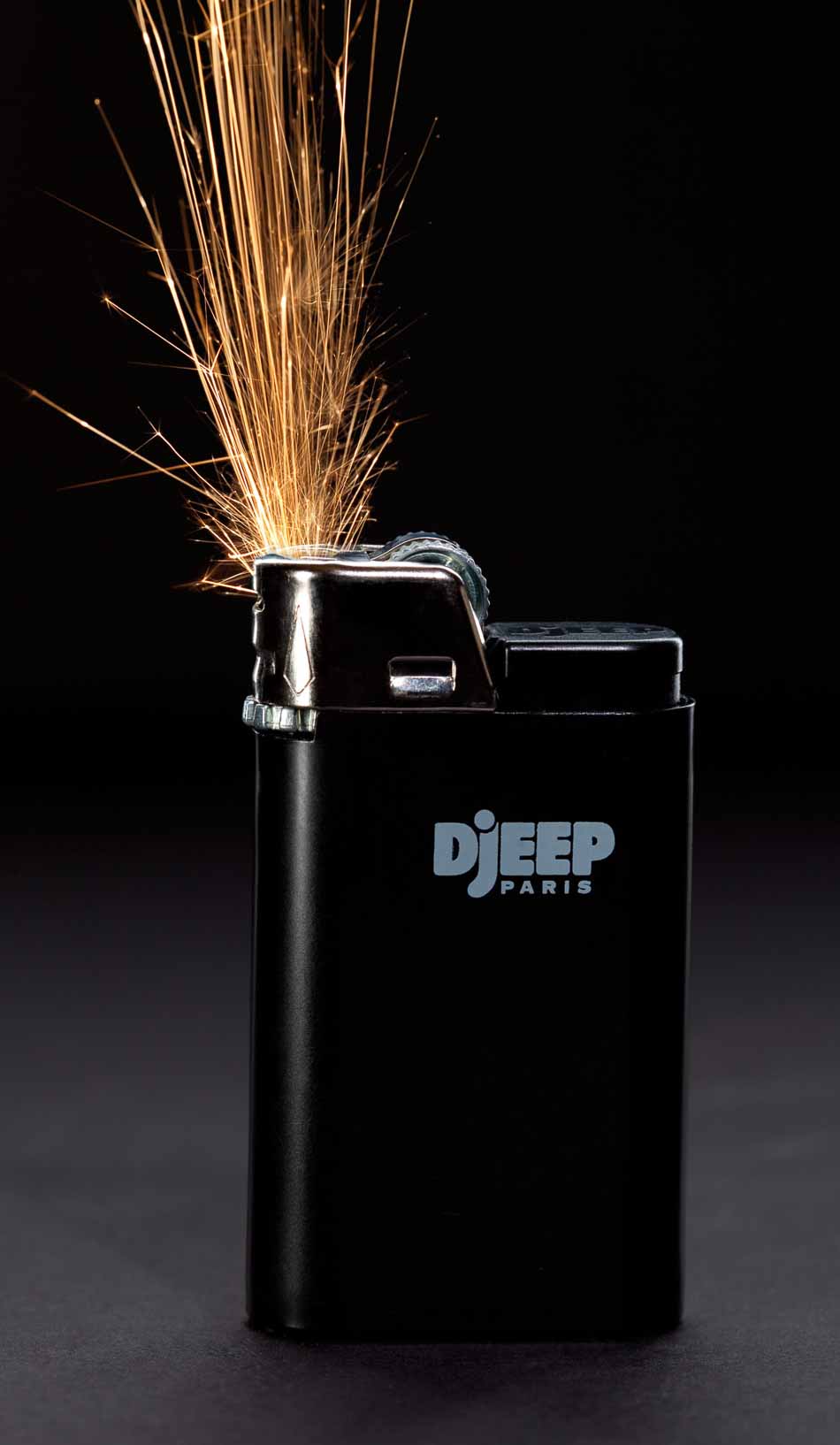 Dramatic product photography of sparks coming from Djeep Lighter | Special Effects | Fire | Shot in Denver, Colorado