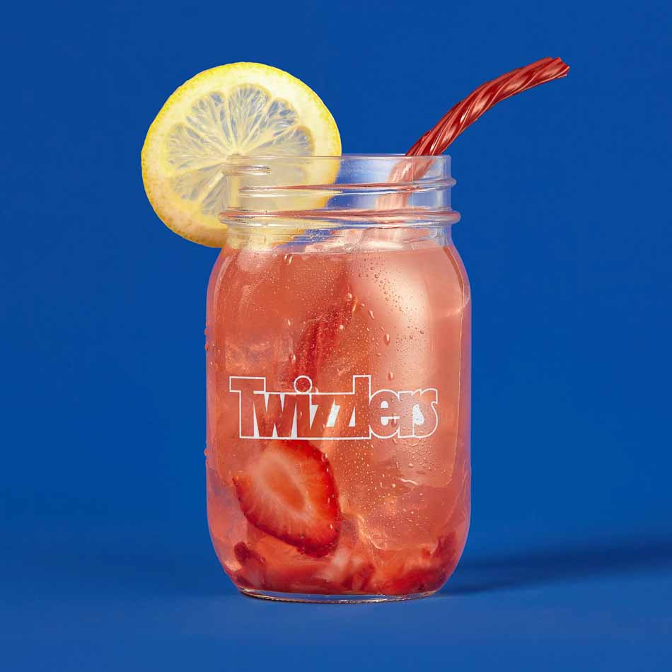 Twizzlers straw in pink lemonade on blue background | Food Photography | Studio Photography | Social | Still Life Photography shot in Boulder, Colorado for Crispin Porter + Bogusky