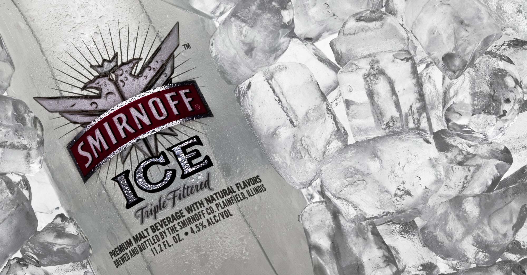 Close-up product photo of a Smirnoff Ice bottle with crushed ice.
